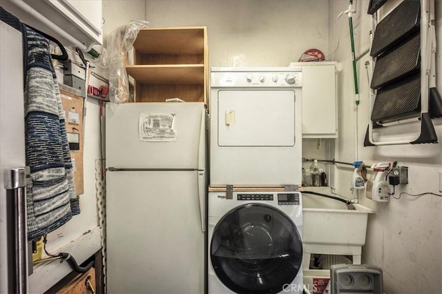 25837 Sunset Loop, Twin Peaks, CA 92391 - laundry area with stacked washer / drying machine