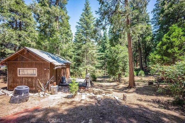 25837 Sunset Loop, Twin Peaks, CA 92391 - view of yard with an outbuilding and a wooded view