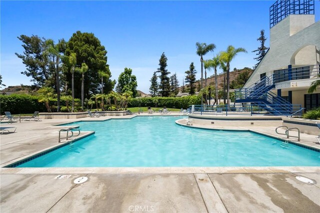 222 N Singingwood St Unit 9, Orange, CA 92869 - community pool with a patio