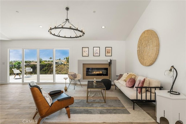 235 Via Ballena, San Clemente, CA 92672 - living area with a chandelier, wood finished floors, a glass covered fireplace, and recessed lighting