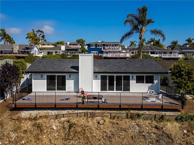 235 Via Ballena, San Clemente, CA 92672 - rear view of property featuring a residential view, a patio area, a chimney, and roof with shingles
