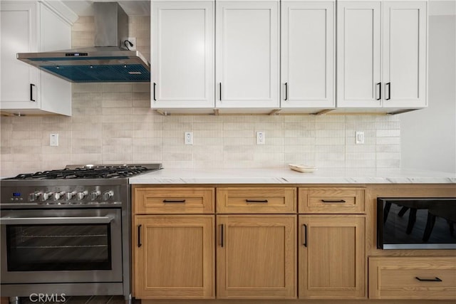 235 Via Ballena, San Clemente, CA 92672 - kitchen with high end stainless steel range oven, wall chimney exhaust hood, light countertops, and backsplash