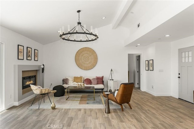 235 Via Ballena, San Clemente, CA 92672 - living area with a chandelier, light wood-style flooring, recessed lighting, and a glass covered fireplace
