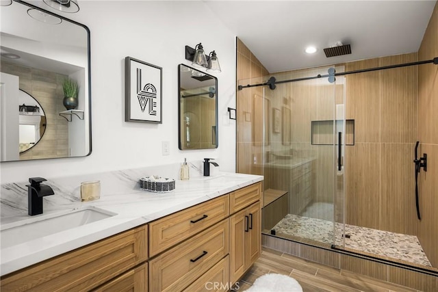 235 Via Ballena, San Clemente, CA 92672 - full bathroom featuring a stall shower, double vanity, wood finish floors, and recessed lighting