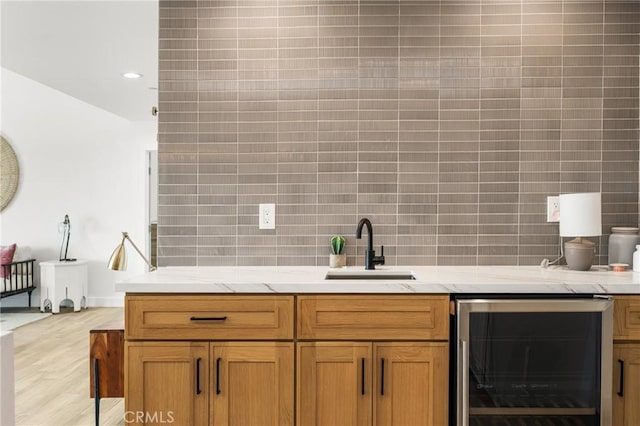 235 Via Ballena, San Clemente, CA 92672 - bar area featuring wine cooler, backsplash, and light wood-type flooring
