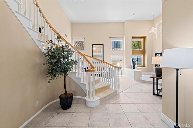 45422 Camino Monzon, Temecula, CA 92592 - stairway featuring a chandelier and tile patterned flooring