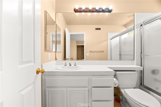 45422 Camino Monzon, Temecula, CA 92592 - bathroom with vanity and bath / shower combo with glass door