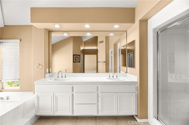 45422 Camino Monzon, Temecula, CA 92592 - full bath featuring double vanity, a shower stall, a bath, recessed lighting, and tile patterned floors