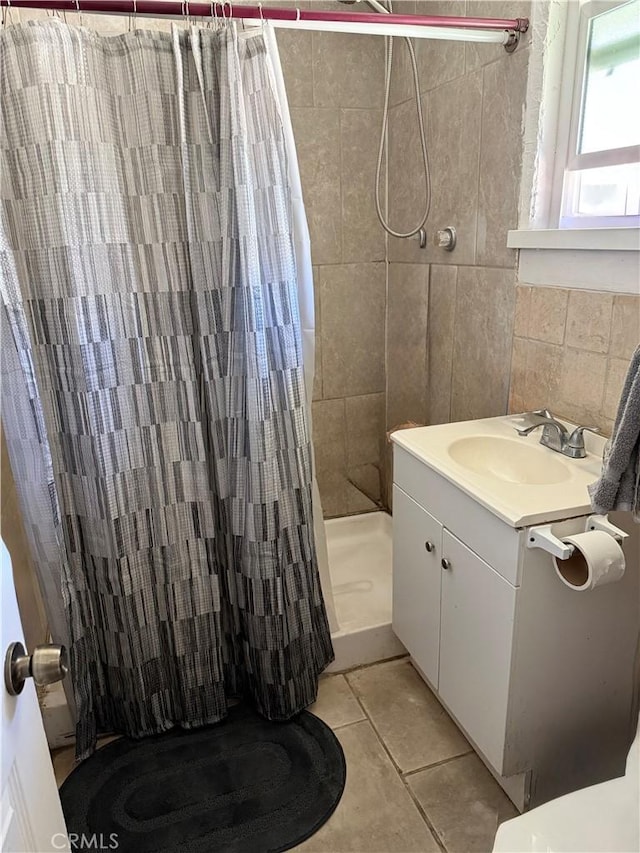 2340 Pine St, Rosemead, CA 91770 - full bath featuring tiled shower, tile patterned flooring, and vanity