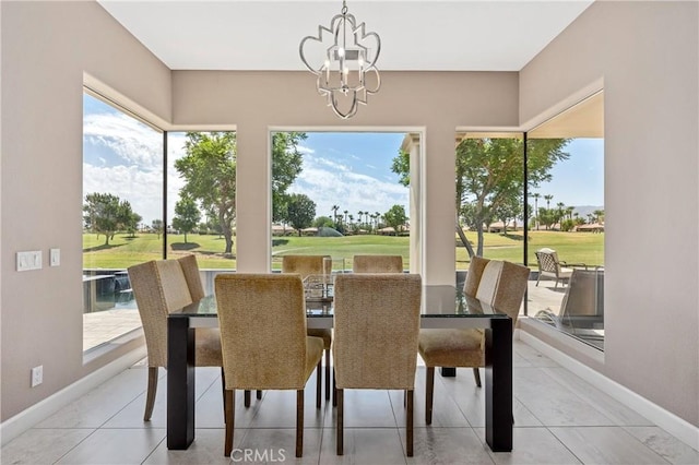 56720 Jack Nicklaus Blvd, La Quinta, CA 92253 - dining space featuring golf course view, a chandelier, and light tile patterned floors