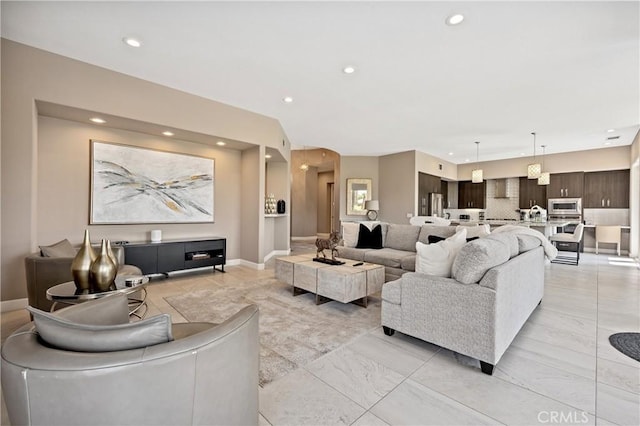 56720 Jack Nicklaus Blvd, La Quinta, CA 92253 - living area with recessed lighting and light marble finish flooring