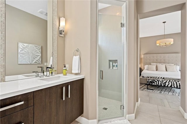 56720 Jack Nicklaus Blvd, La Quinta, CA 92253 - bathroom featuring a shower stall, vanity, connected bathroom, and tile patterned floors