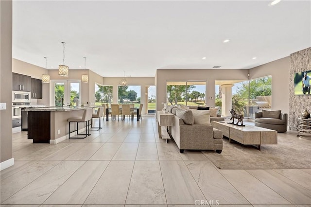56720 Jack Nicklaus Blvd, La Quinta, CA 92253 - living area featuring recessed lighting and baseboards