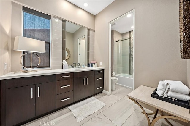 56720 Jack Nicklaus Blvd, La Quinta, CA 92253 - full bathroom featuring double vanity, shower / bathtub combination, and marble look tile flooring