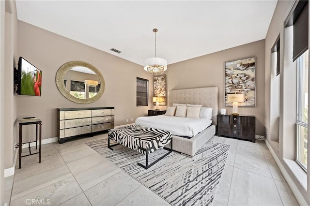 56720 Jack Nicklaus Blvd, La Quinta, CA 92253 - bedroom featuring marble look tile flooring