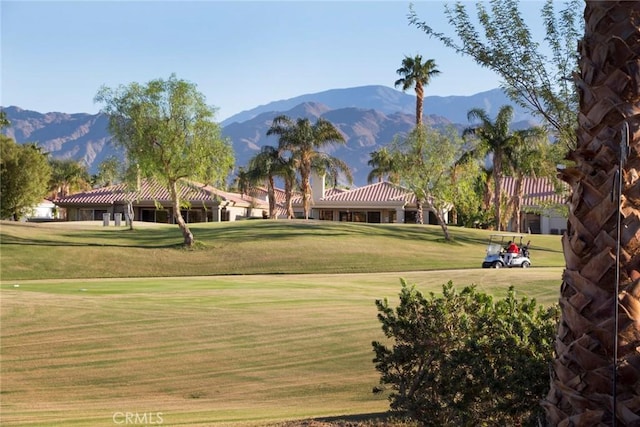 56720 Jack Nicklaus Blvd, La Quinta, CA 92253 - view of community with a mountain view, a yard, and golf course view