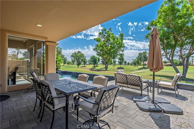 56720 Jack Nicklaus Blvd, La Quinta, CA 92253 - view of patio featuring an outdoor living space and outdoor dining space