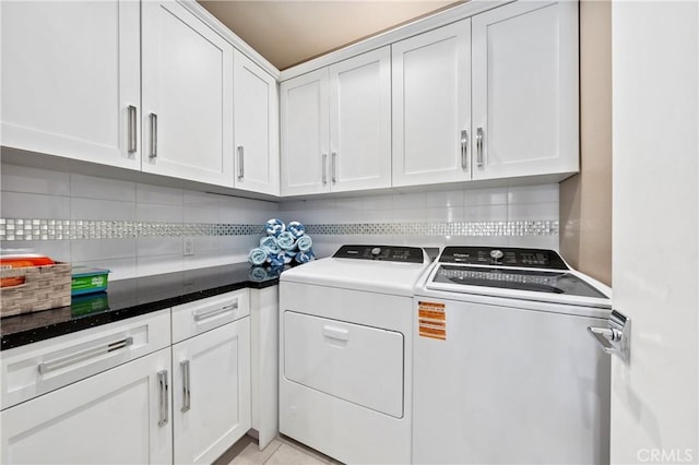 56720 Jack Nicklaus Blvd, La Quinta, CA 92253 - washroom featuring separate washer and dryer and cabinet space