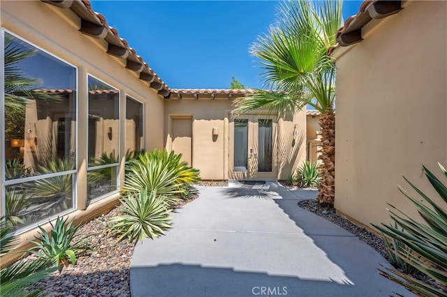 56720 Jack Nicklaus Blvd, La Quinta, CA 92253 - view of patio / terrace featuring french doors