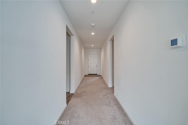 29601 Tulipwood St, Menifee, CA 92584 - hallway featuring light carpet and recessed lighting