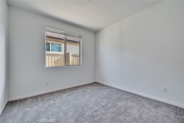 29601 Tulipwood St, Menifee, CA 92584 - carpeted empty room with baseboards