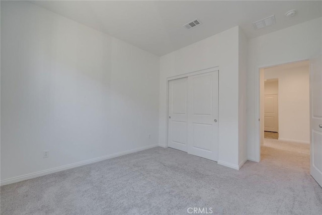 29601 Tulipwood St, Menifee, CA 92584 - unfurnished bedroom featuring carpet and a closet