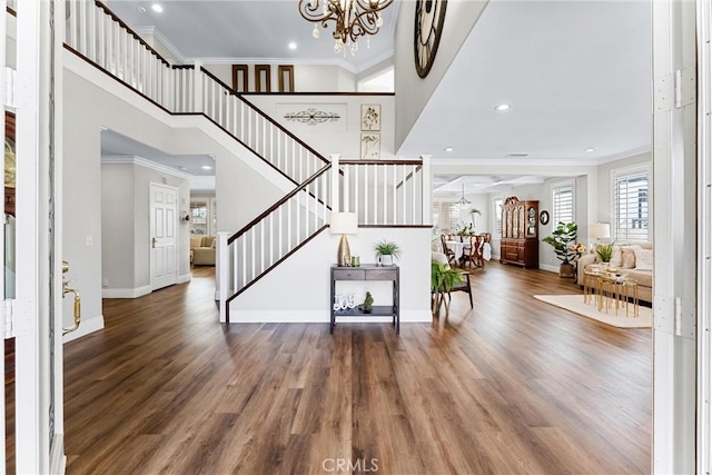 2571 Stetson Dr, Norco, CA 92860 - foyer entrance featuring stairway, crown molding, a chandelier, wood finished floors, and recessed lighting