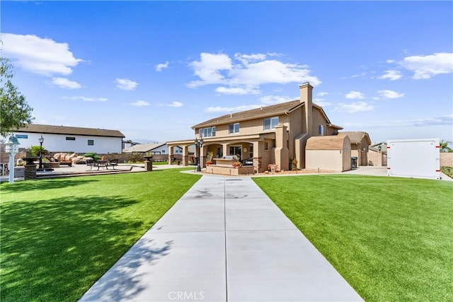 2571 Stetson Dr, Norco, CA 92860 - view of front of property featuring stucco siding, a patio, a chimney, and a front lawn