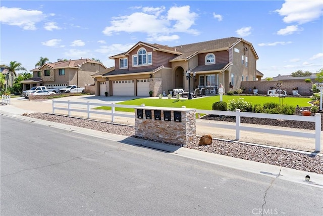 2571 Stetson Dr, Norco, CA 92860 - view of front of property with a garage, stucco siding, driveway, and a residential view
