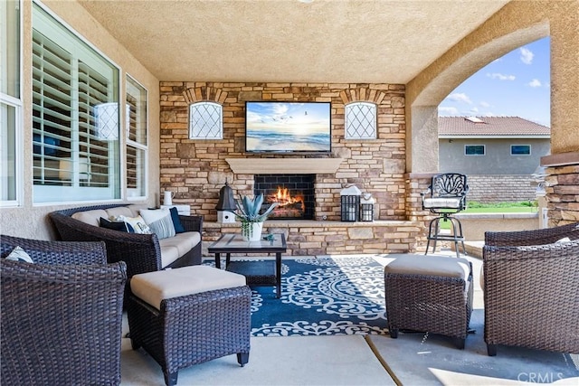 2571 Stetson Dr, Norco, CA 92860 - view of patio / terrace with an outdoor living space with a fireplace