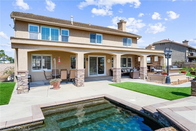 2571 Stetson Dr, Norco, CA 92860 - back of house featuring stucco siding, a patio, and a chimney
