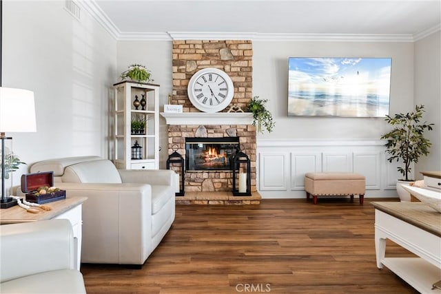 2571 Stetson Dr, Norco, CA 92860 - living area featuring ornamental molding, dark wood-style floors, and a fireplace