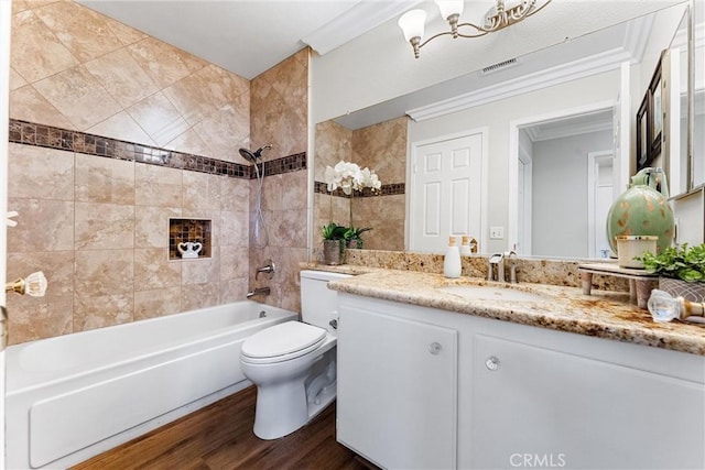 2571 Stetson Dr, Norco, CA 92860 - bathroom with vanity, shower / bath combination, wood finished floors, and ornamental molding