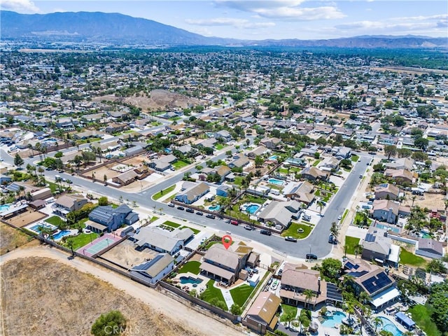 2571 Stetson Dr, Norco, CA 92860 - aerial view of property and surrounding area featuring mountains and nearby suburban area