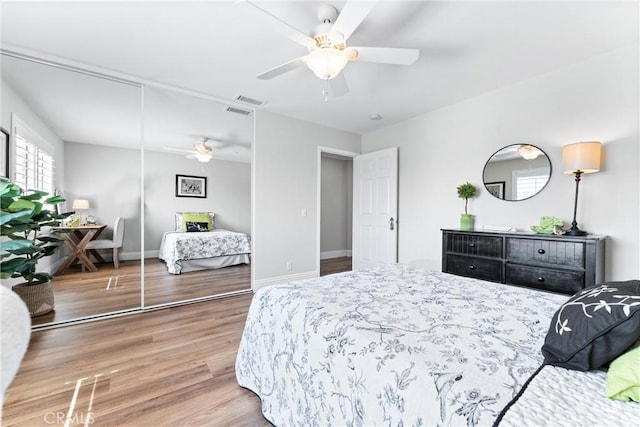2571 Stetson Dr, Norco, CA 92860 - bedroom featuring wood finished floors and a ceiling fan