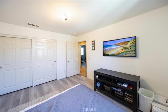 29767 Ascella Ln, Murrieta, CA 92563 - bedroom featuring wood finished floors and a closet