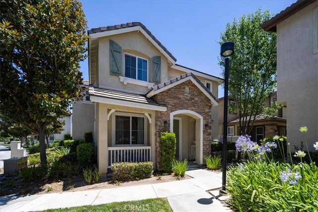 29767 Ascella Ln, Murrieta, CA 92563 - view of front of home featuring stone siding and stucco siding