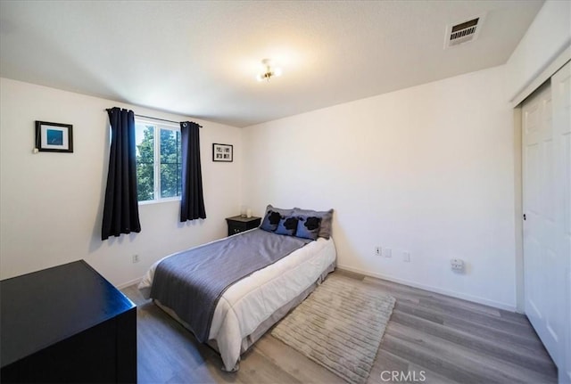 29767 Ascella Ln, Murrieta, CA 92563 - bedroom with wood finished floors and baseboards