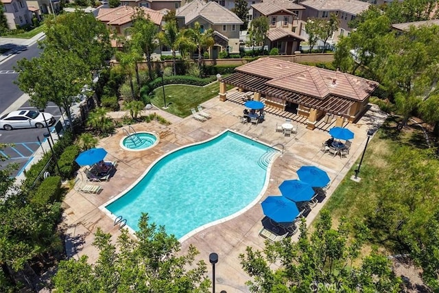29767 Ascella Ln, Murrieta, CA 92563 - community pool with a patio area, a residential view, and a hot tub