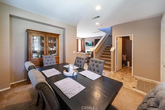29767 Ascella Ln, Murrieta, CA 92563 - dining area featuring stairway, light colored carpet, and recessed lighting