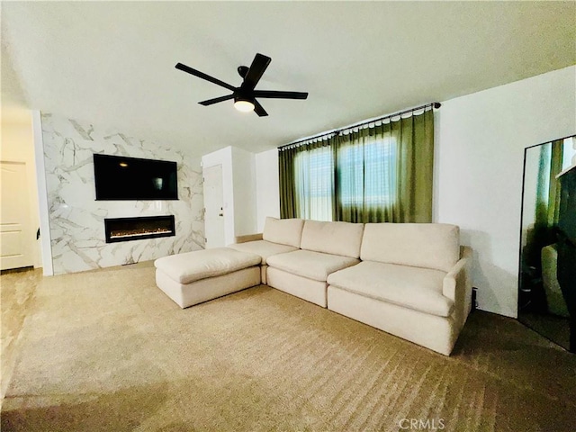 2851 S La Cadena Dr Unit 125, Colton, CA 92324 - living area with ceiling fan, carpet flooring, and a high end fireplace