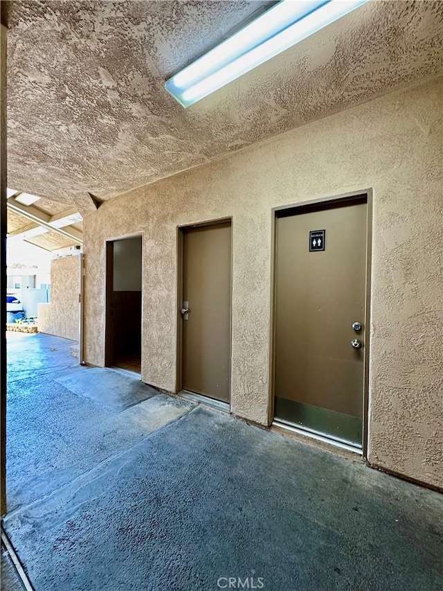 2851 S La Cadena Dr Unit 125, Colton, CA 92324 - view of exterior entry featuring stucco siding