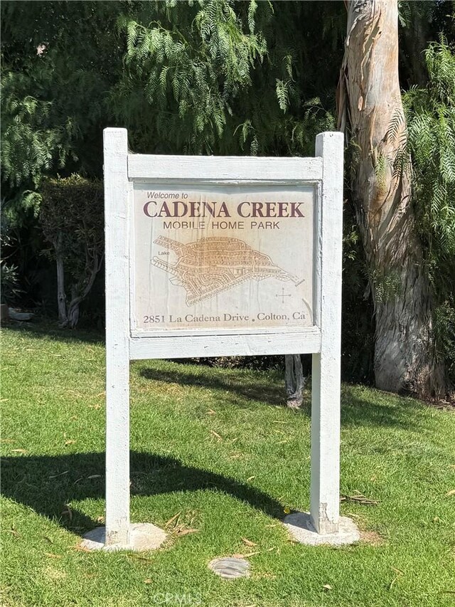 2851 S La Cadena Dr Unit 125, Colton, CA 92324 - community sign featuring a lawn