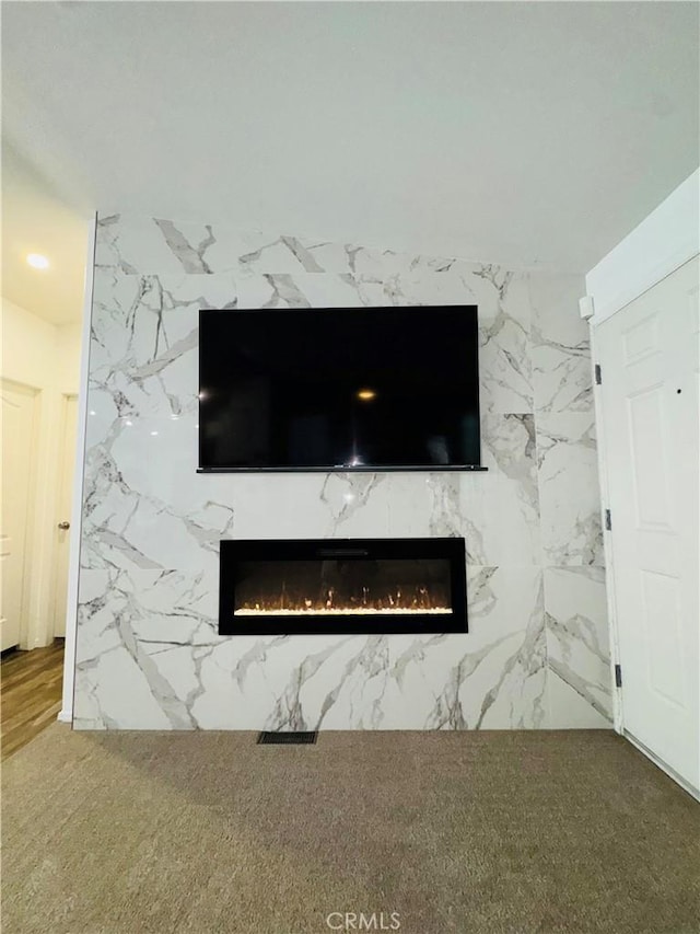2851 S La Cadena Dr Unit 125, Colton, CA 92324 - detailed view of a high end fireplace and recessed lighting