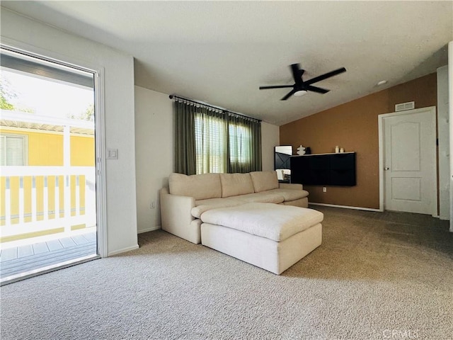 2851 S La Cadena Dr Unit 125, Colton, CA 92324 - living area with lofted ceiling, a ceiling fan, and carpet