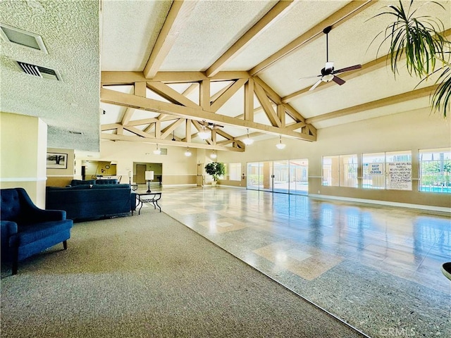 2851 S La Cadena Dr Unit 125, Colton, CA 92324 - community lobby with high vaulted ceiling, beamed ceiling, and a textured ceiling