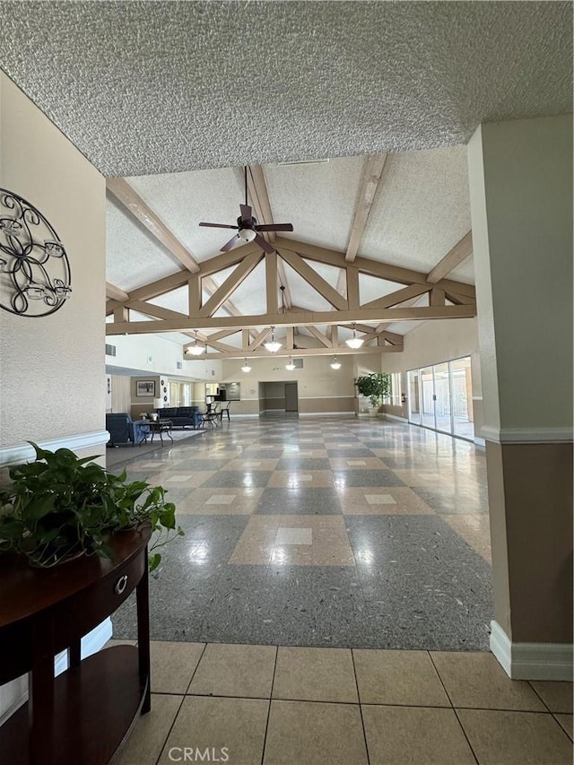 2851 S La Cadena Dr Unit 125, Colton, CA 92324 - corridor featuring baseboards and a textured ceiling