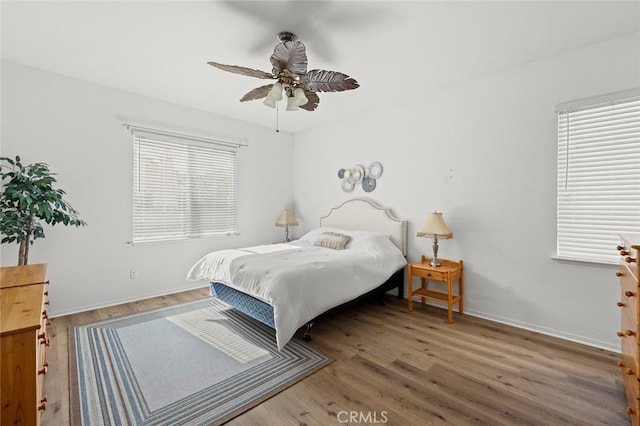 28253 Harmony Ln, Menifee, CA 92584 - bedroom with wood finished floors and ceiling fan