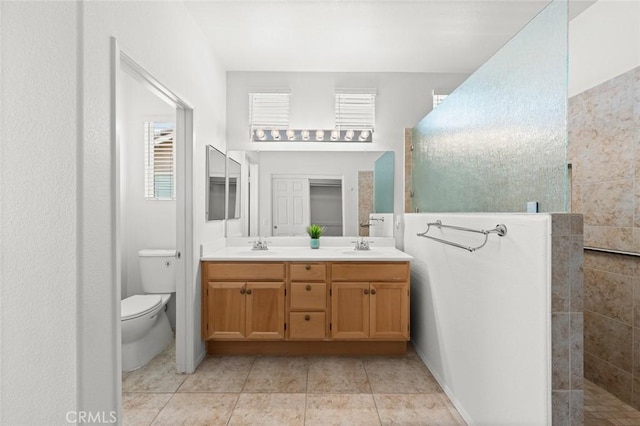 28253 Harmony Ln, Menifee, CA 92584 - bathroom featuring walk in shower, double vanity, and plenty of natural light