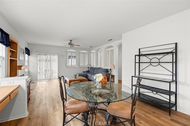28253 Harmony Ln, Menifee, CA 92584 - dining space featuring light wood finished floors and a ceiling fan
